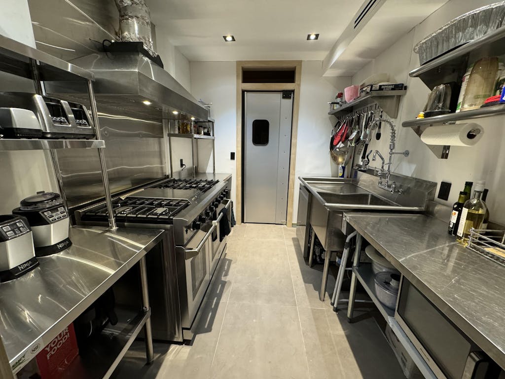 Thor Kitchen 2-Piece Appliance Package - 48-Inch Gas Range & Pro Wall Mount Hood in Stainless Steel