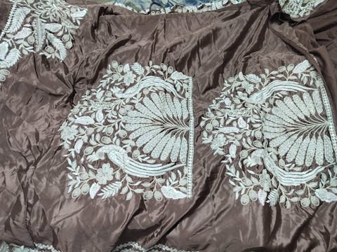 White Color Sequined-Threaded Satin Silk Heavy Embroidered Various Motif Zarkan work Semi-Stitched Lehenga choli