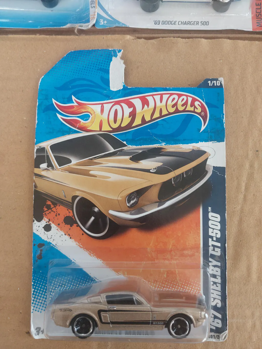 CARD DAMAGE - IMPORTED - HOT WHEELS -  67 SHELBY GT-500 - GOLD - 7A
