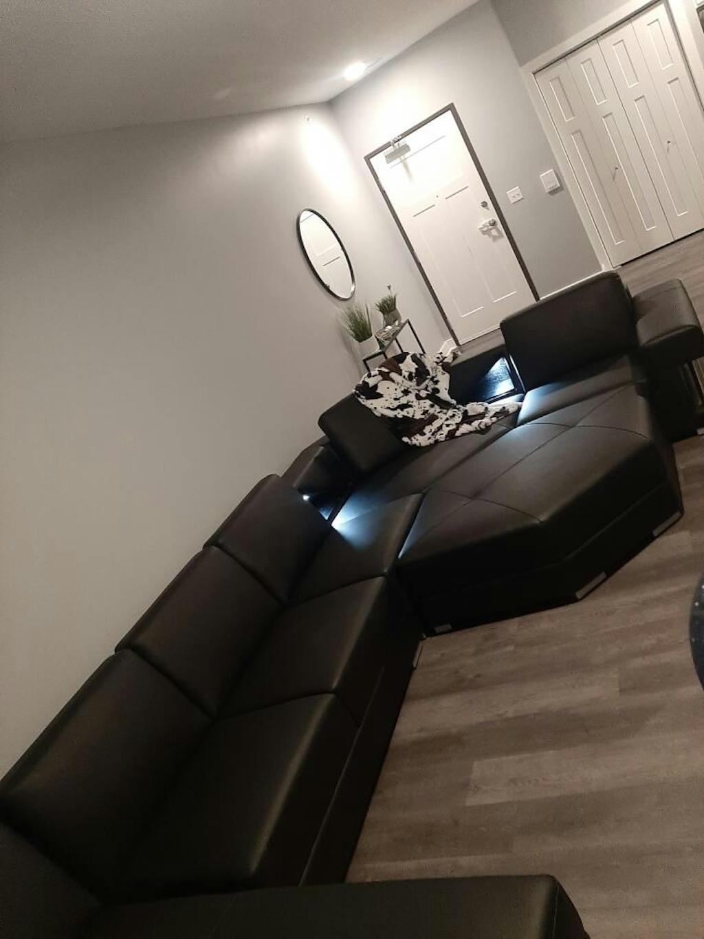 Modern Stoughton Leather Sectional With OttomanJubilee Furniture Store