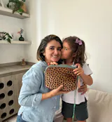 CROSSBODY CHEETAH AGAVE EN CUERO VERDE Y PELO ANIMAL PRINT