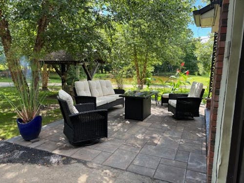 LayinSun 10 Piece Patio Set with wicker Swivel Rocking Chairs and Fire Pit