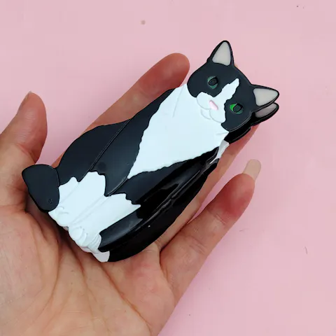 Adorable Medium Black and White Cow Cat Hair Claw