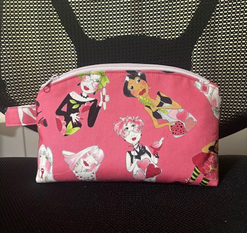 Tossed Lookers Pink Fabric Yard