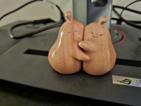 Peo Carved Wooden Hugging Pears Full of Love