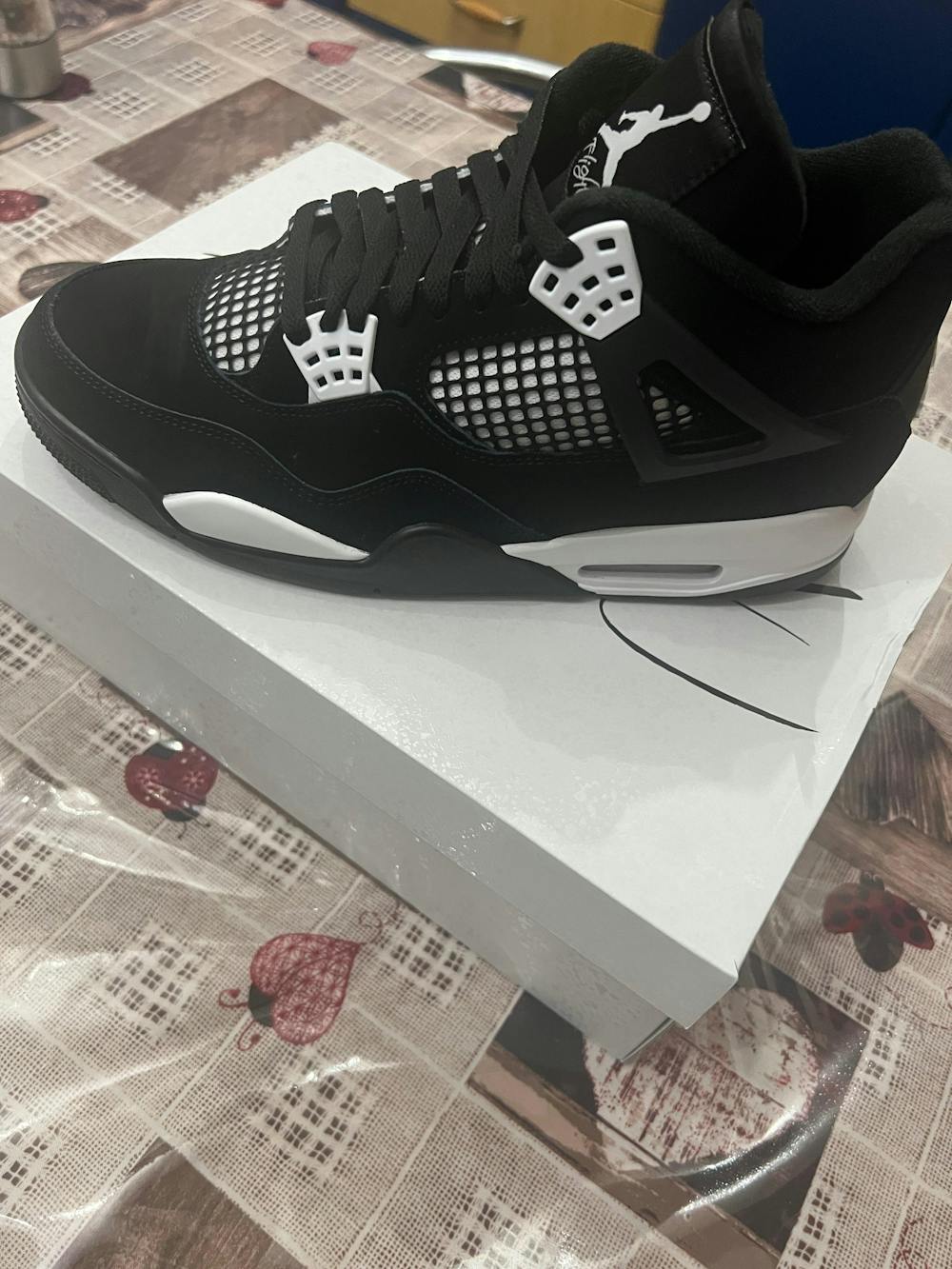 Air Jordan 4 Retro White Cement (2025)
