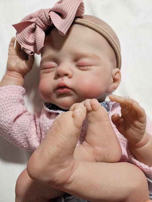 19 inches Soft Body Sleeping Irys Reborn Doll In Pink Foral Dress
