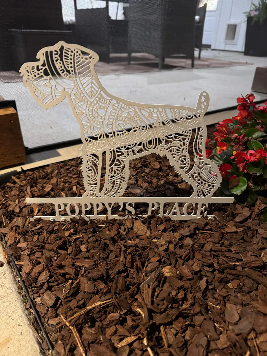 Customer's mandala garden stake in a real garden