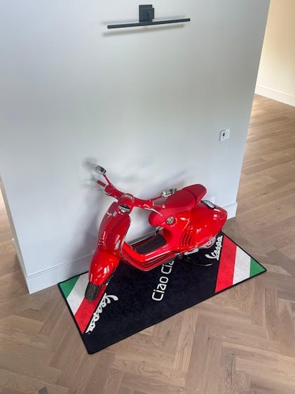 https://judgeme.imgix.net/motorcycle-pit-mat/1698348205__vespa-rahyl-duha-4__original.jpg?auto=format&w=160&dpr=2.625&w=360