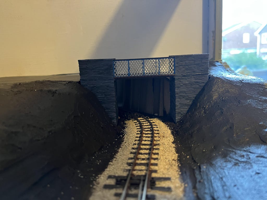 Slate Built Single Track Rail Under Footbridge