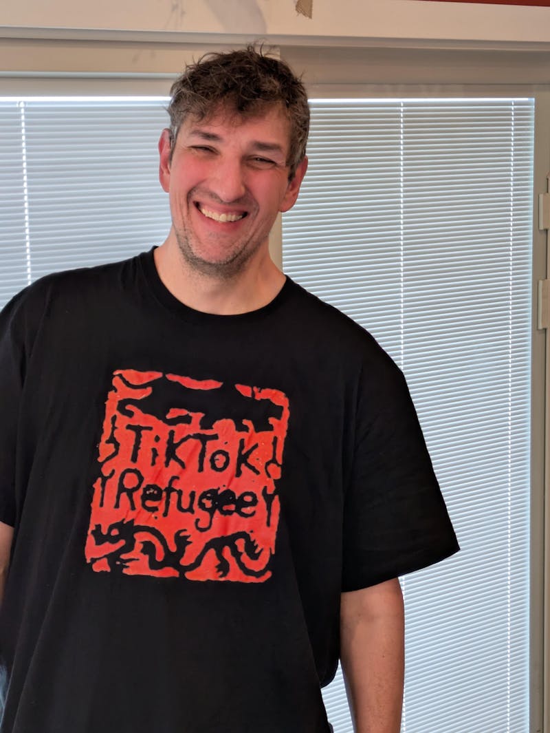 TikTok Refugee Stamp Gildan Unisex T-shirt (180g)