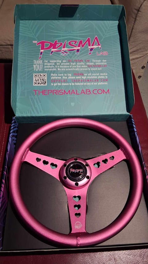 NRG Innovations x Prisma Lab - 350mm Aluminum Steering Wheel - Pink w/Heart Cutout Spokes