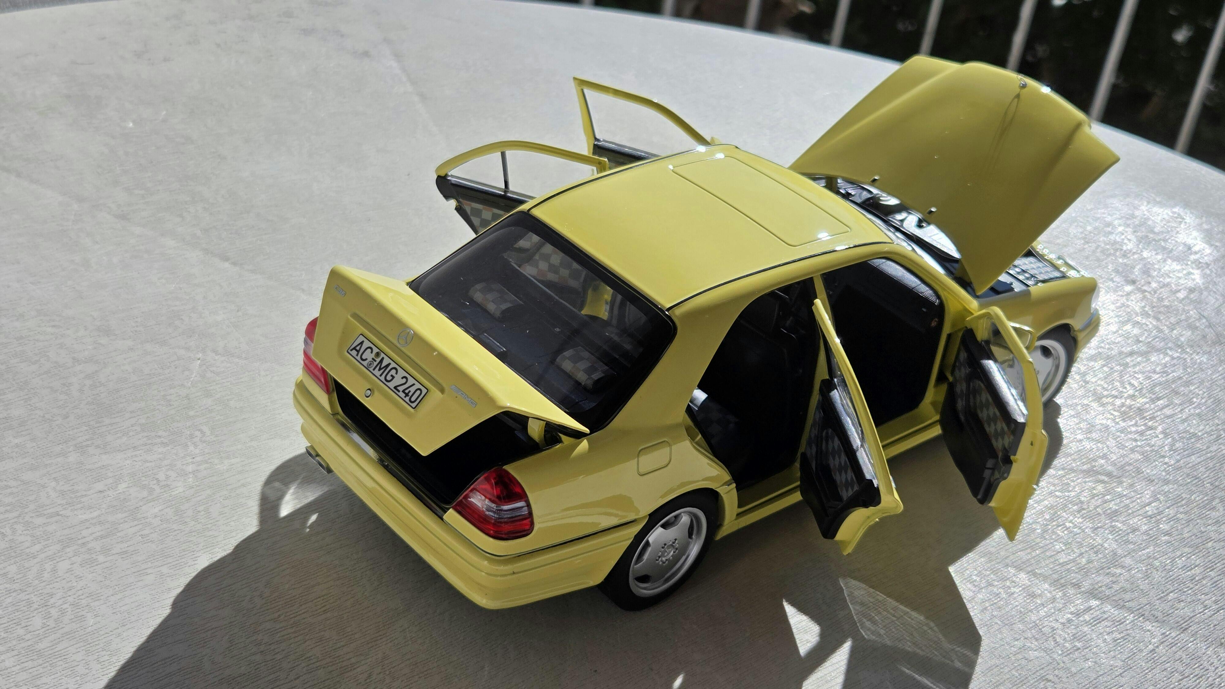 Mercedes-Benz C36 AMG 1993 Light Yellow 1:18 - 200 pcs. – Norev