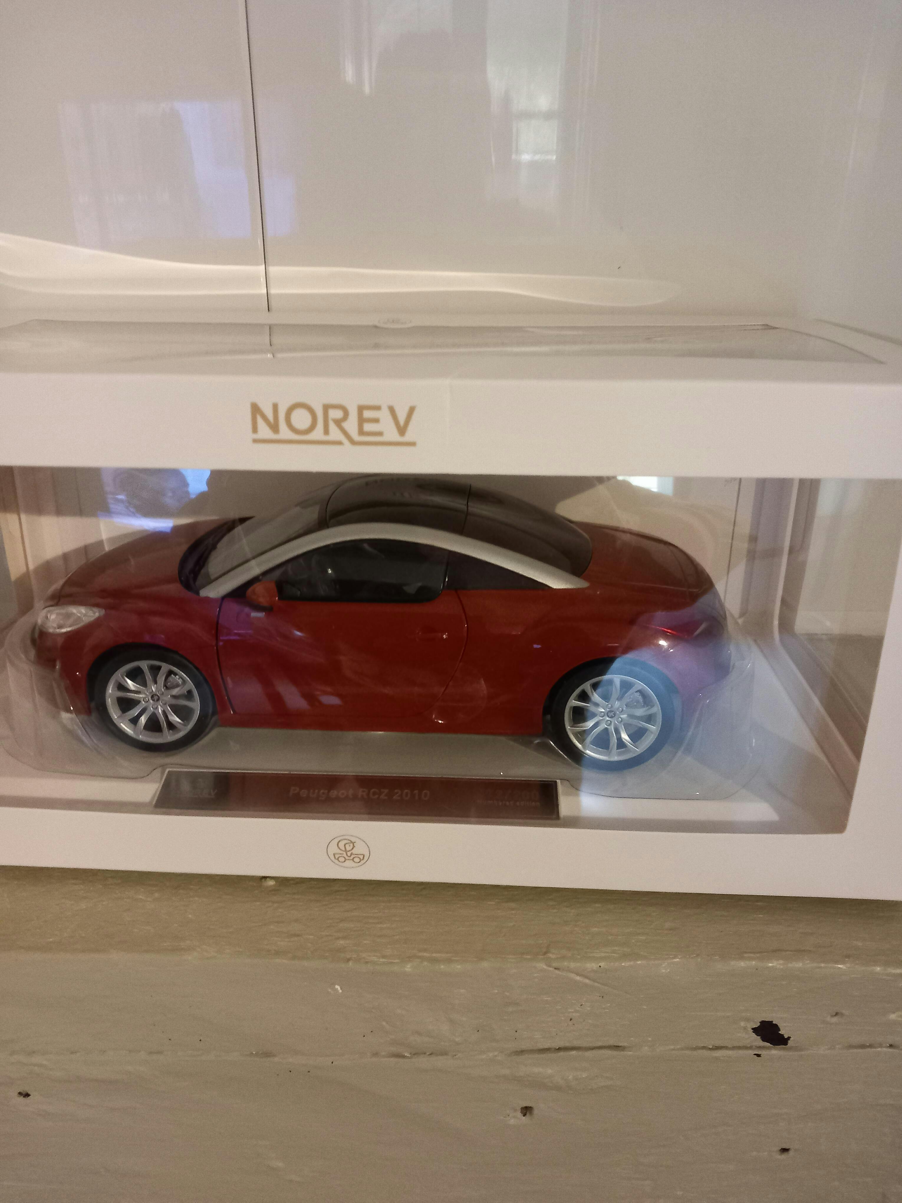 Peugeot RCZ 2010 Amber Red 1:18 - 200pcs – Norev
