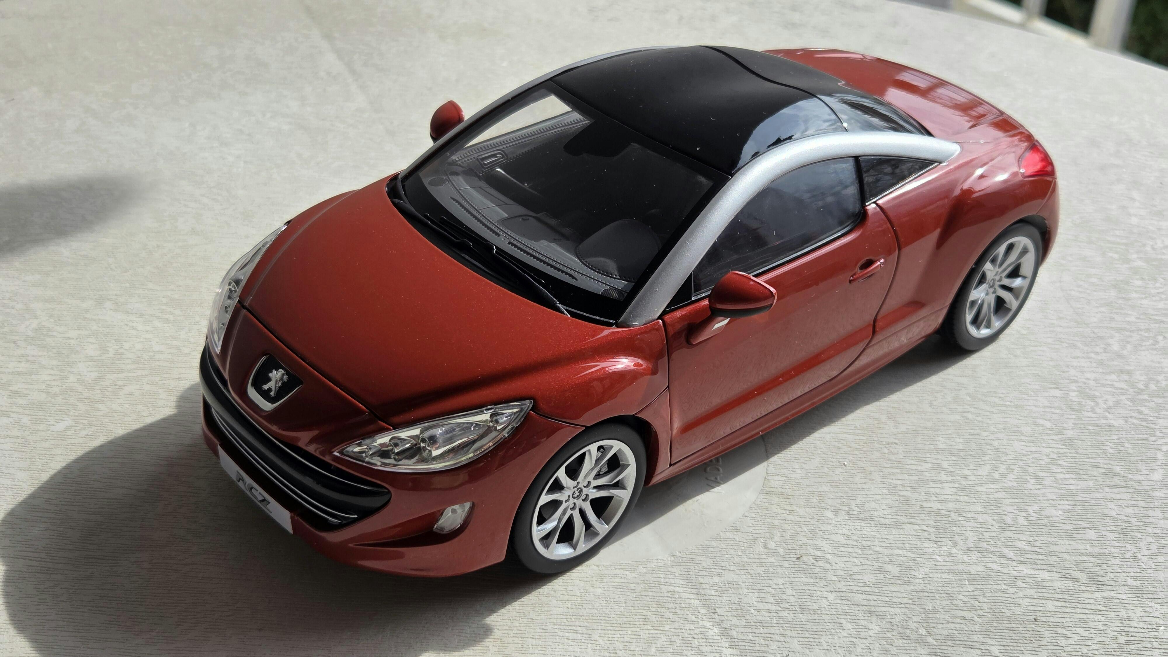 Peugeot RCZ 2010 Amber Red 1:18 - 200pcs – Norev