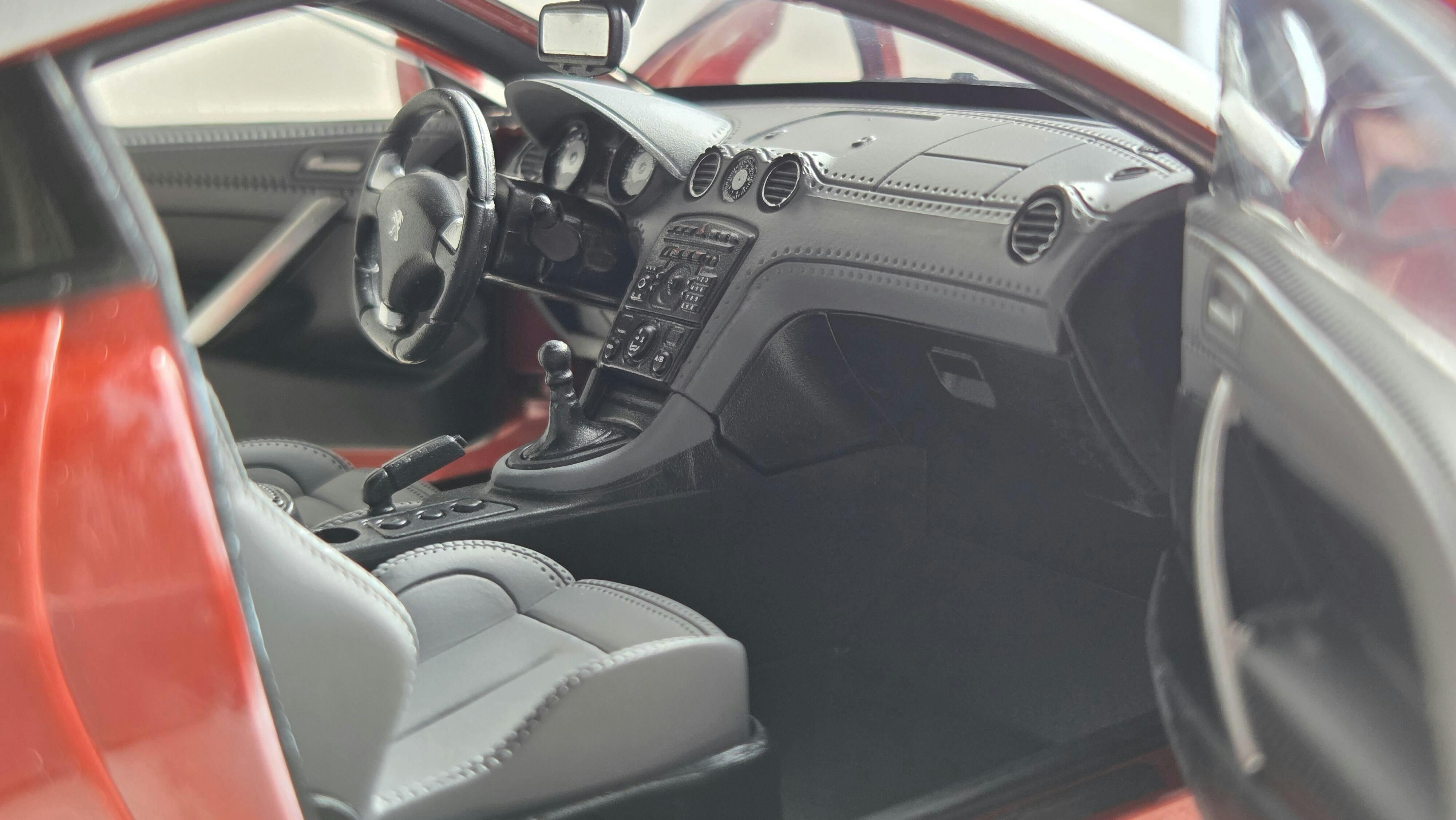 Peugeot RCZ 2010 Amber Red 1:18 - 200pcs – Norev