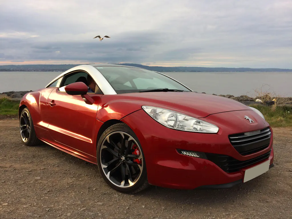 Peugeot RCZ 2010 Amber Red 1:18 - 200pcs – Norev