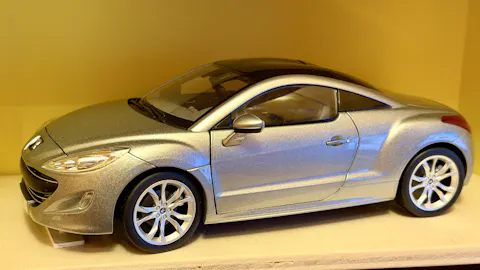 Peugeot RCZ 2010 Mercury Grey 1:18 – Norev