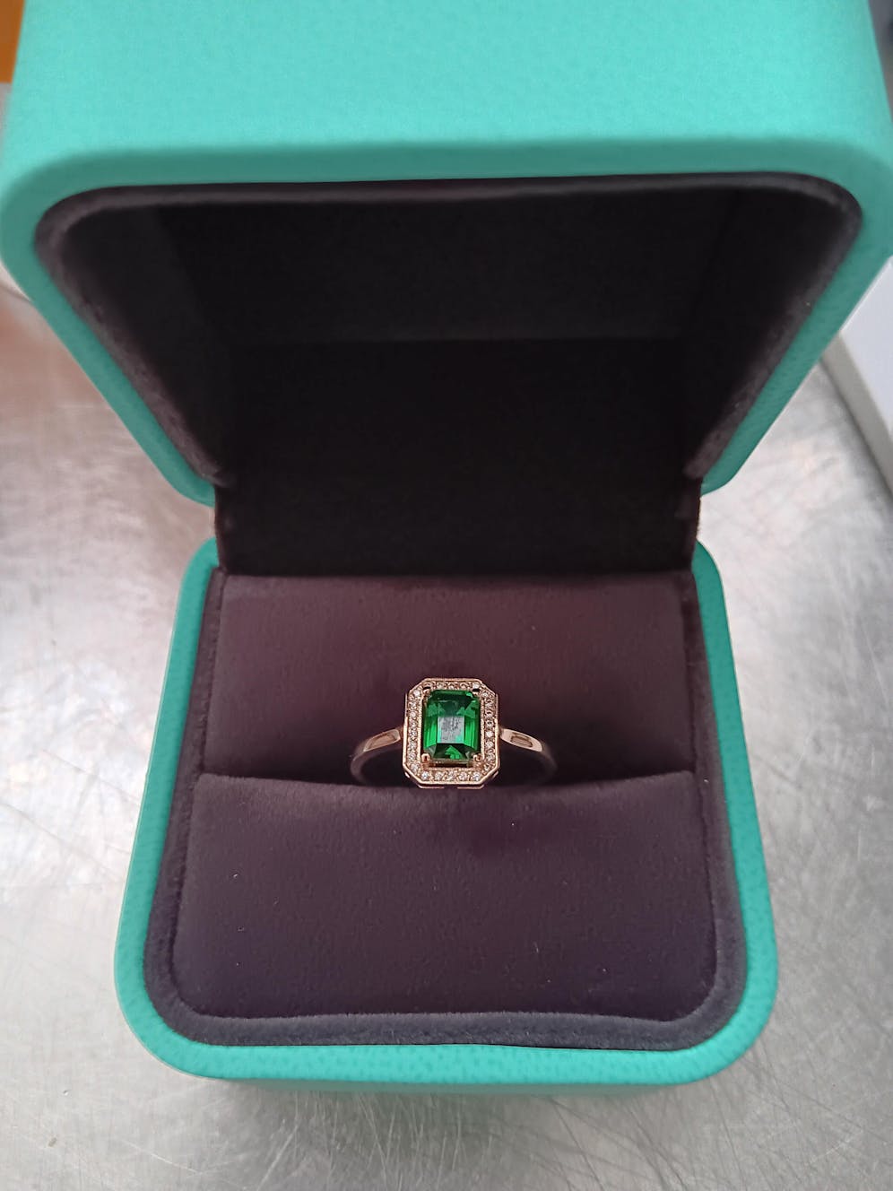 Emerald Halo Engagement Ring in Gold