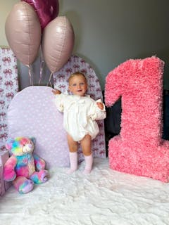Celine Romper (available from size 0-3 m)