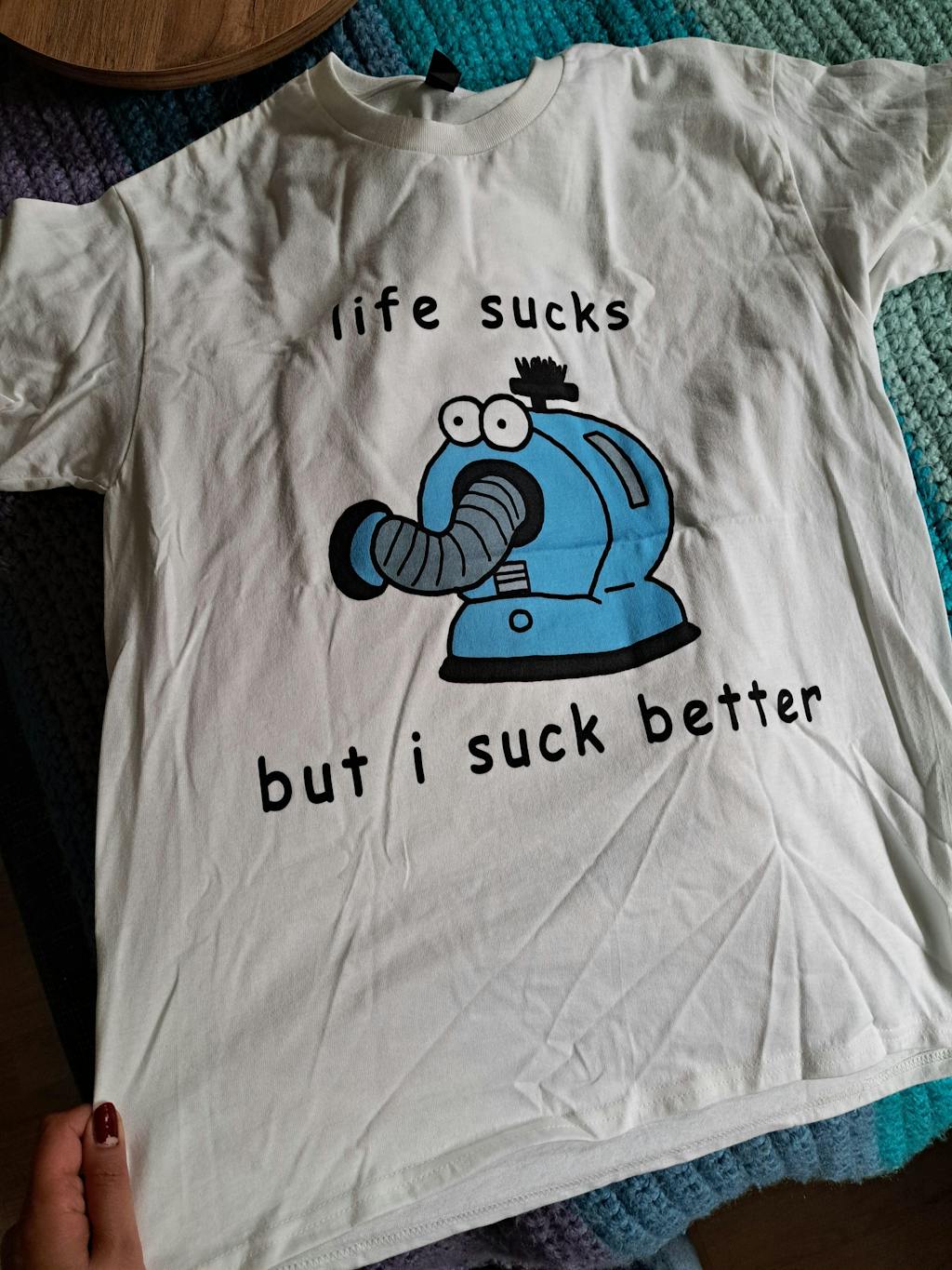 Life sucks but I suck better T-Shirt