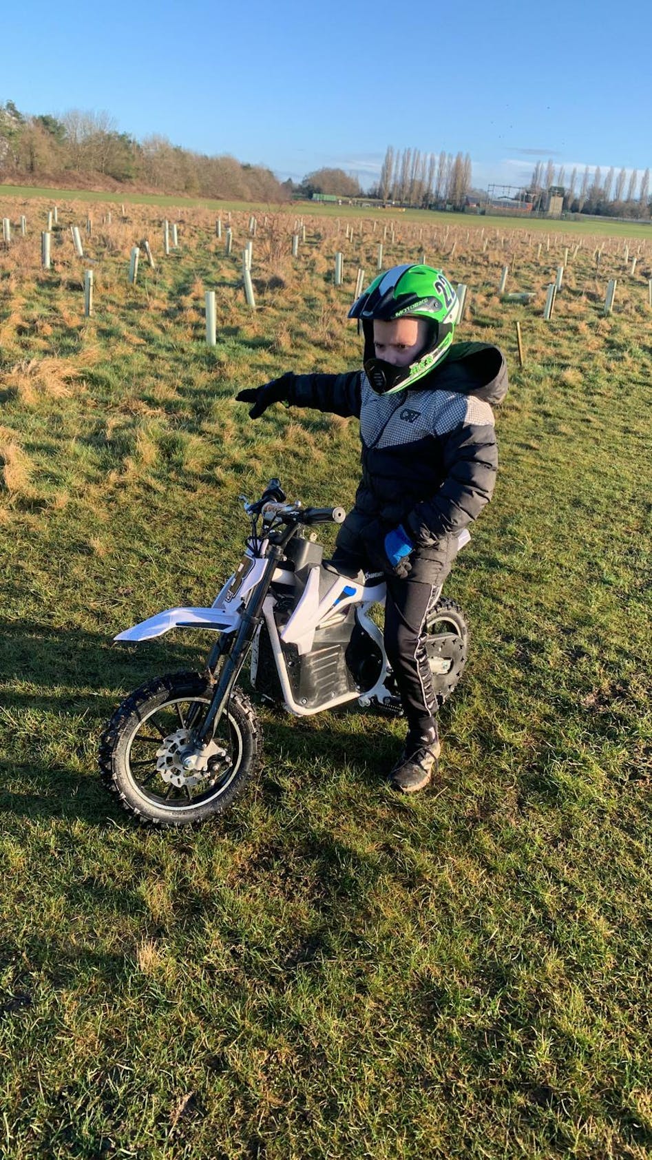Cute little boy ride on online power wheel cross mini bike