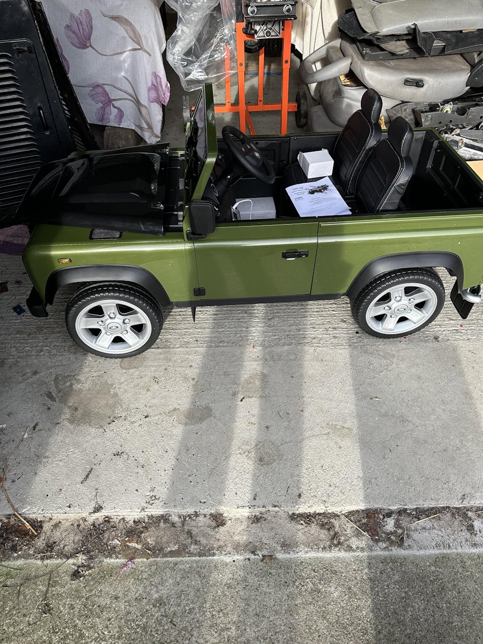 Green Land Rover Defender 90