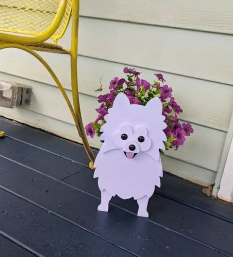 Pot de fleurs en forme de Spitz Nain