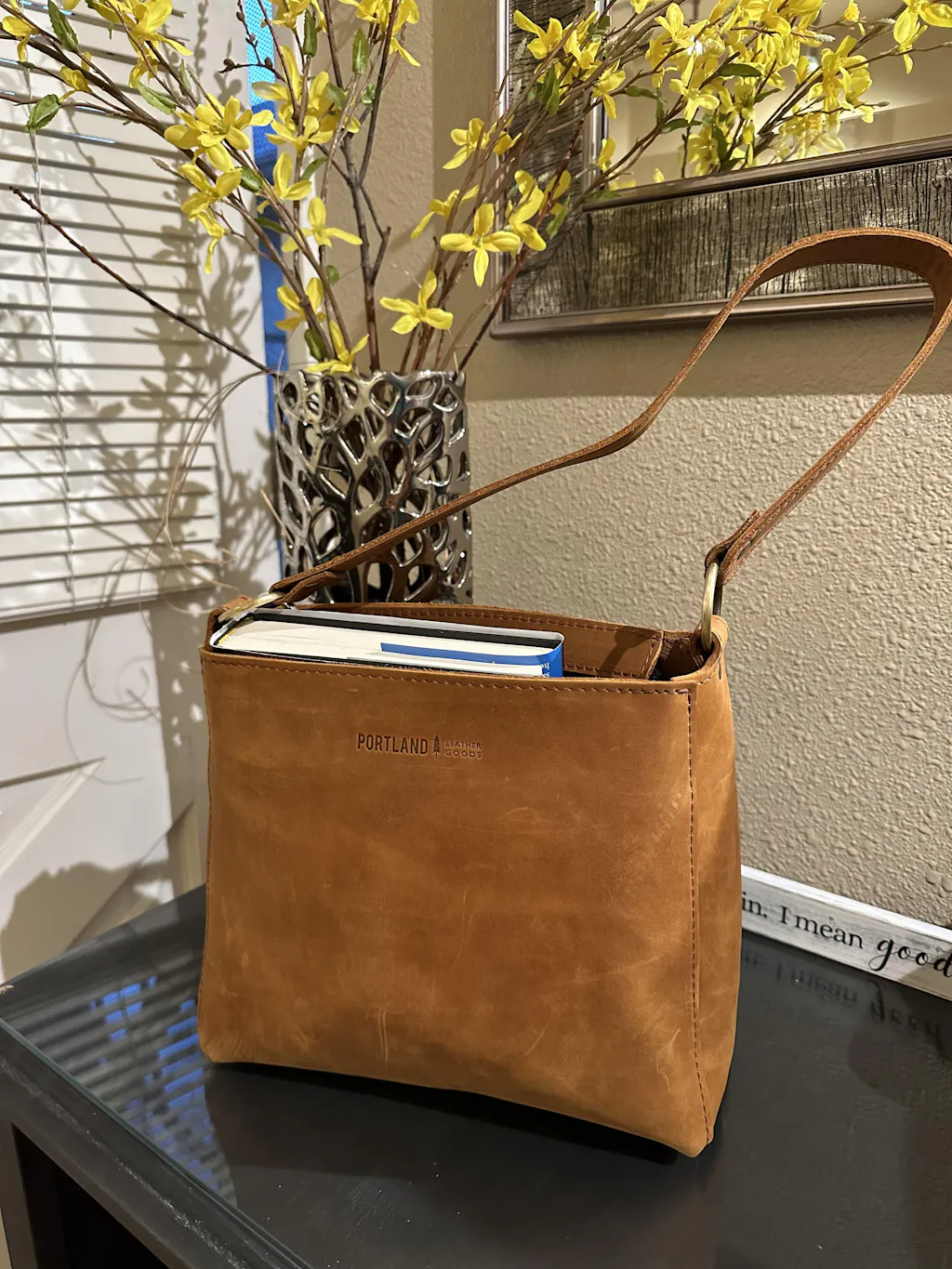 TRIANGLE LOGO SHOULDER BAG 24 IN BLACK SMOOTH CALFSKIN