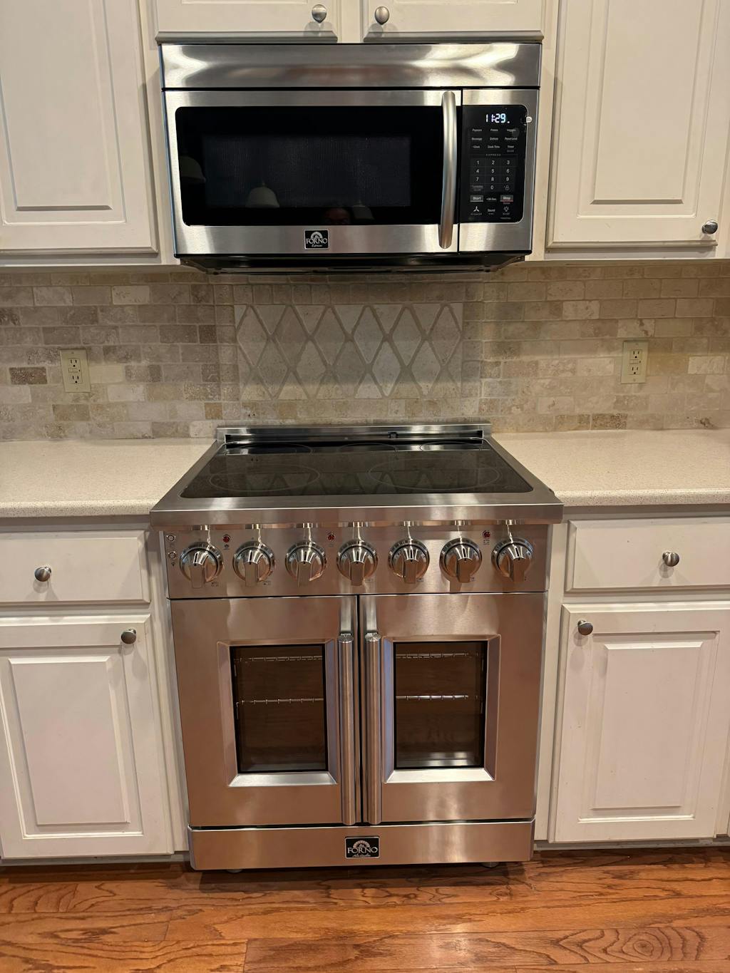 FORNO Scalo 30" 1.6 cu. ft. 300 CFM Over The Range Microwave in Stainless Steel, FOTR3007-30