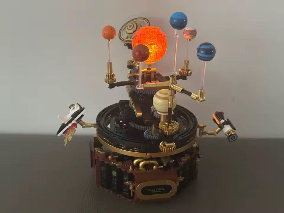Customer photo for Solar System Building Blocks Electric Orrery Kit with LED Sun