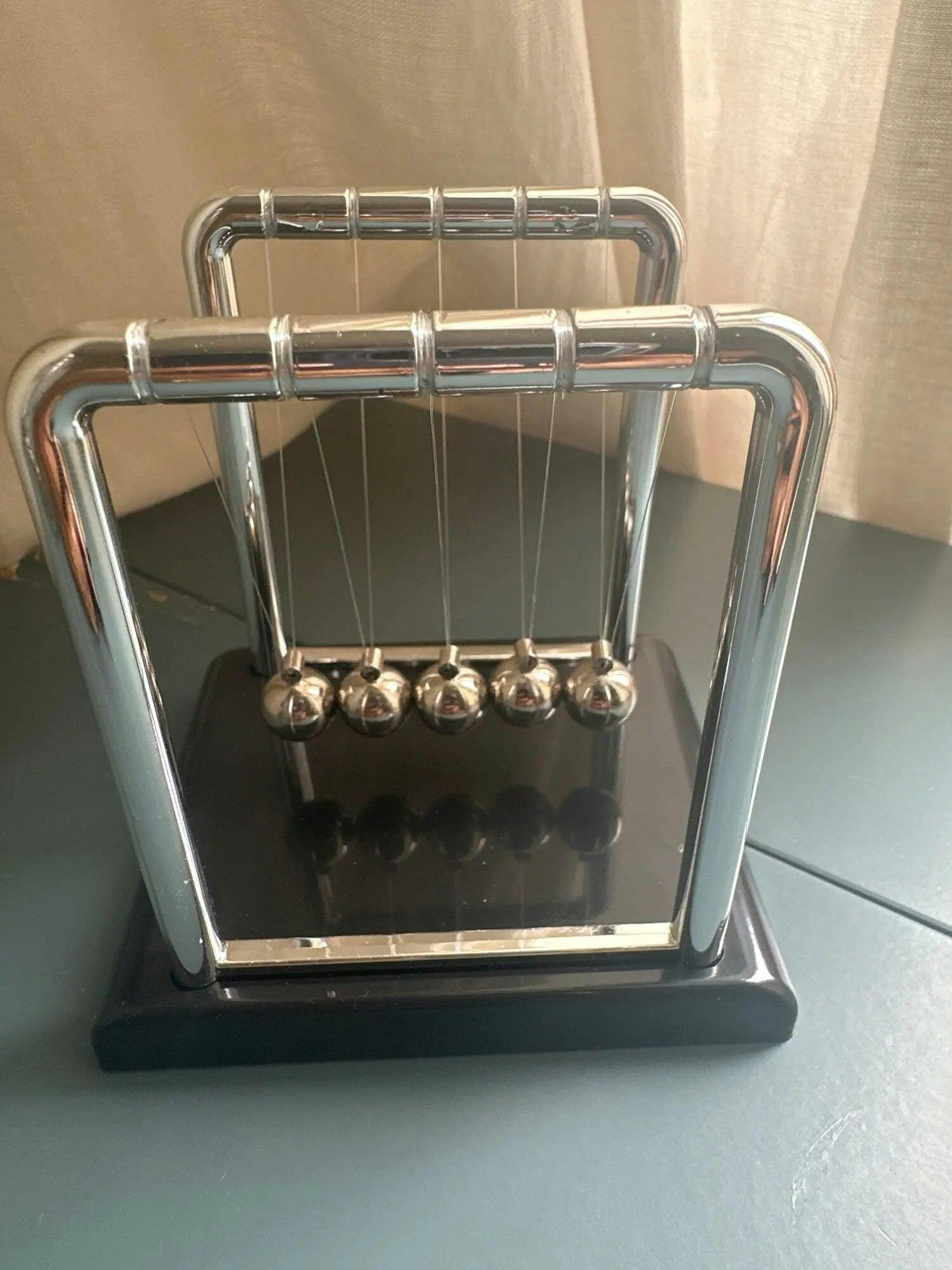 Customer photo for Newton's Cradle — Executive Desk Physics Demonstrator