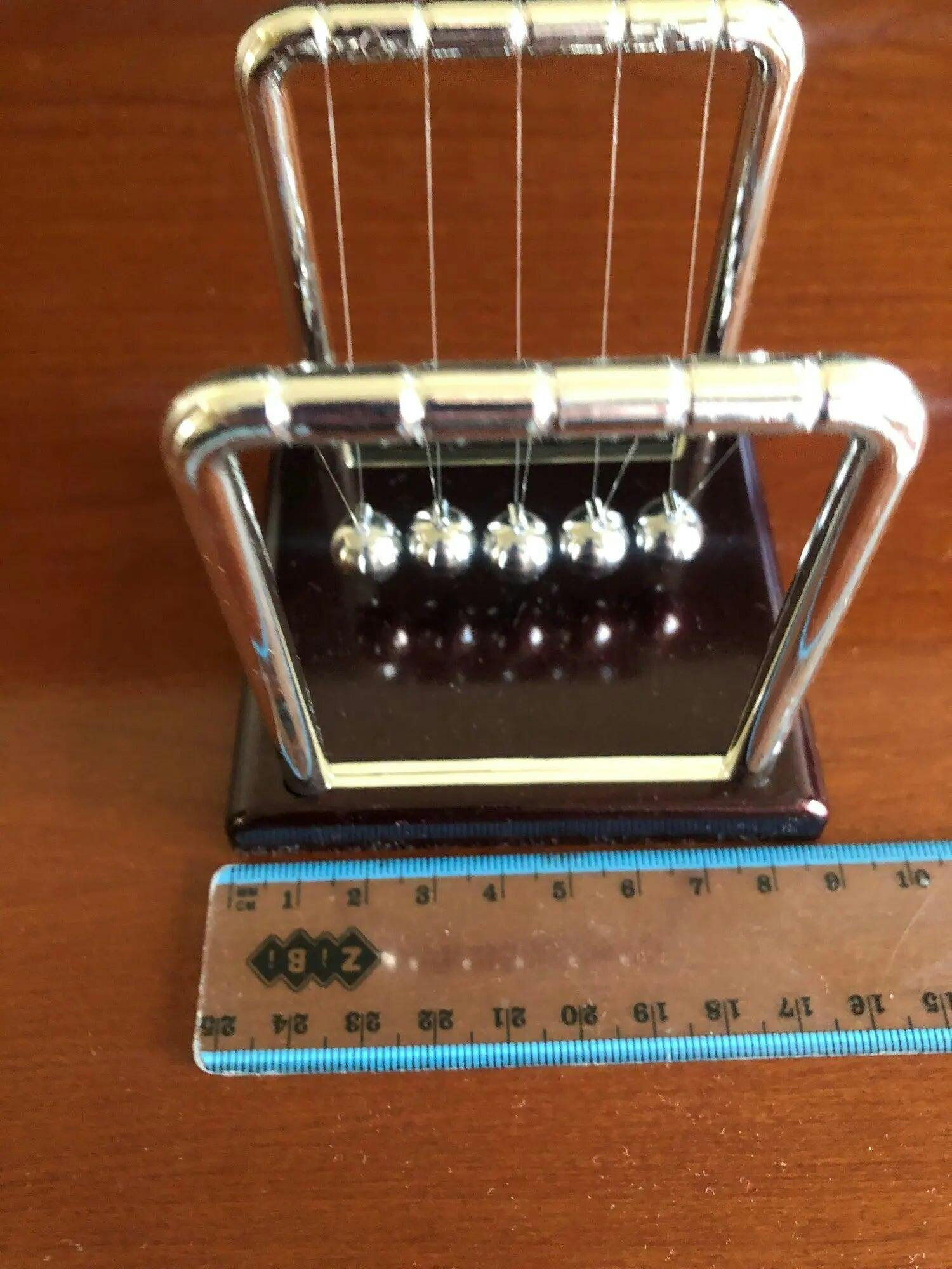 Customer photo for Newton's Cradle — Executive Desk Physics Demonstrator