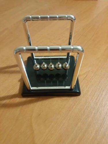 Customer photo for Newton's Cradle — Executive Desk Physics Demonstrator