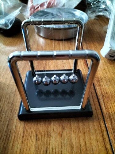 Customer photo for Newton's Cradle — Executive Desk Physics Demonstrator