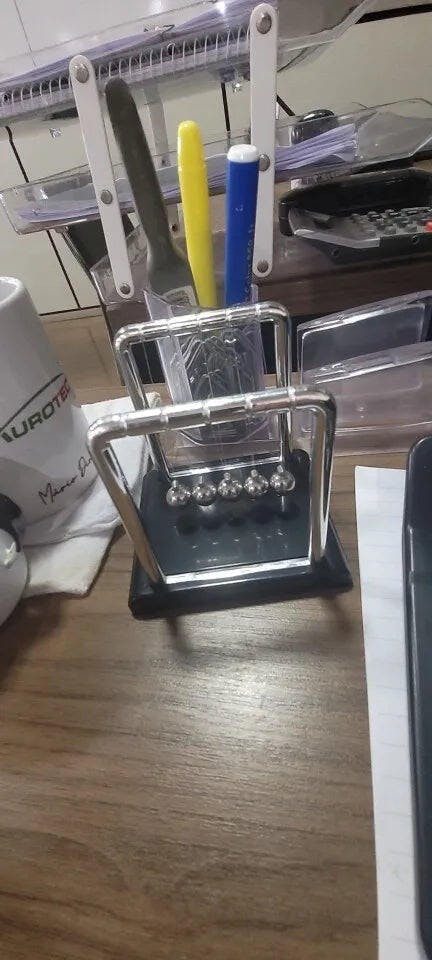 Customer photo for Newton's Cradle — Executive Desk Physics Demonstrator