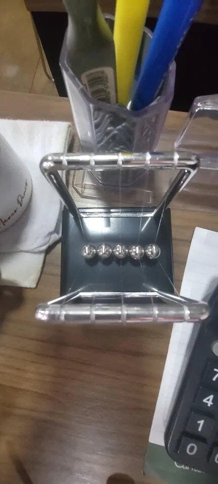 Customer photo for Newton's Cradle — Executive Desk Physics Demonstrator