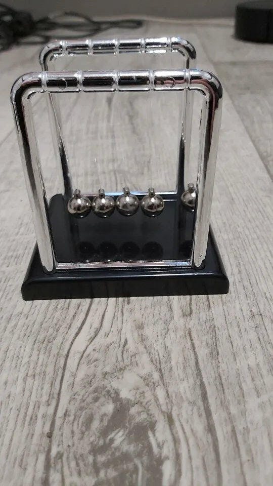 Customer photo for Newton's Cradle — Executive Desk Physics Demonstrator