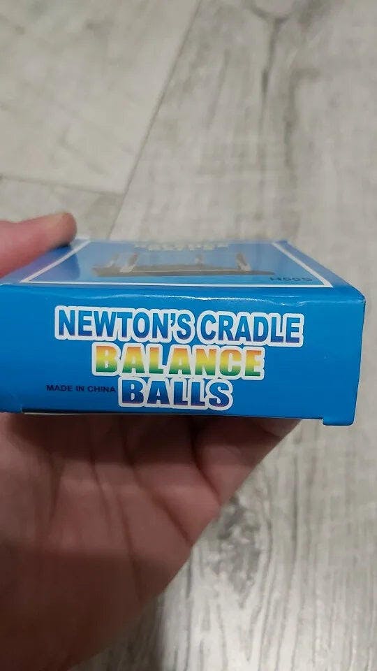Customer photo for Newton's Cradle — Executive Desk Physics Demonstrator
