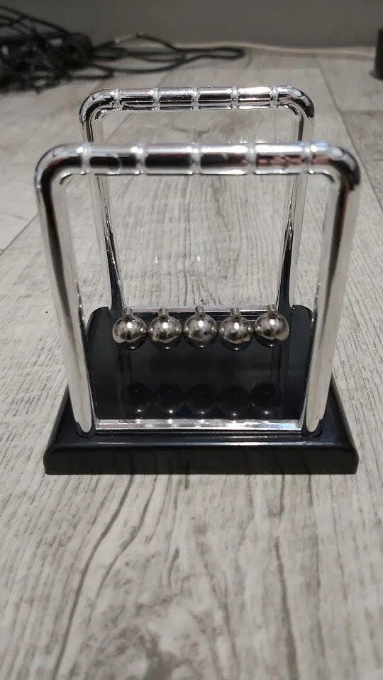 Customer photo for Newton's Cradle — Executive Desk Physics Demonstrator