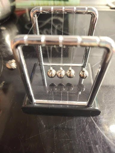 Customer photo for Newton's Cradle — Executive Desk Physics Demonstrator