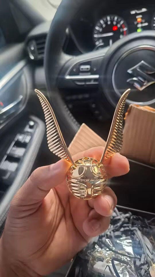 Customer photo for Magical Harry Potter Golden Snitch Ring Box