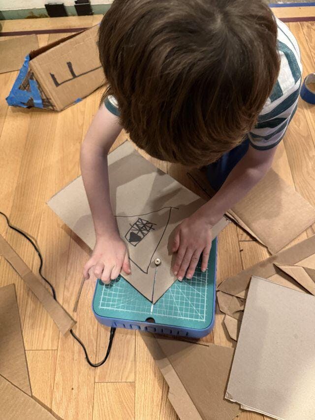 Customer photo for Kid Finger-Safe Cardboard Cutter for Ages 3+