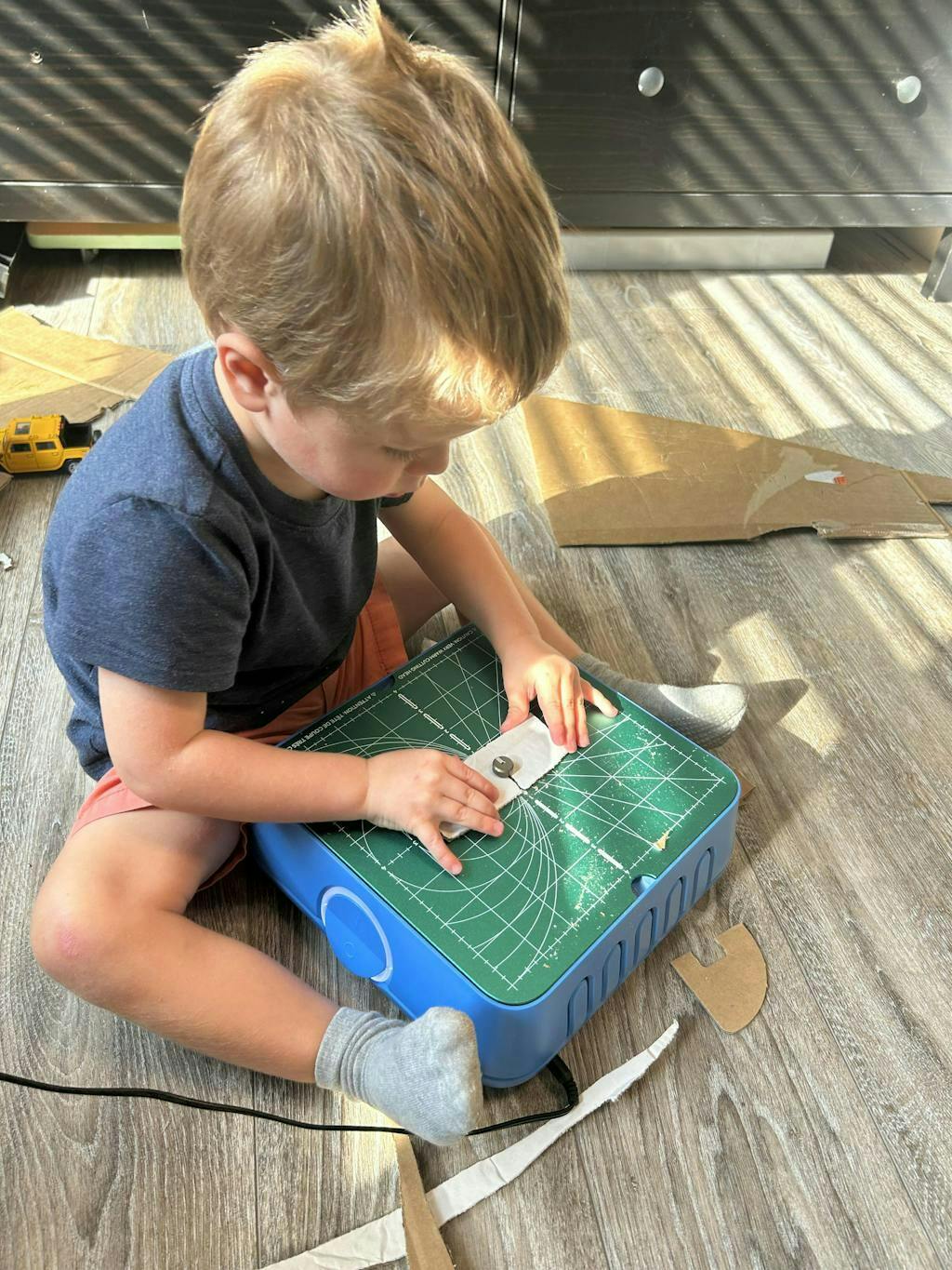 Customer photo for Kid Finger-Safe Cardboard Cutter for Ages 3+
