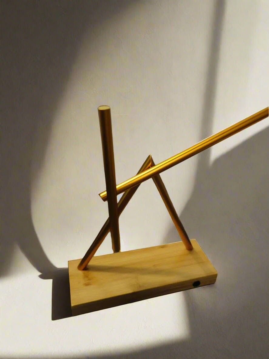 Customer photo for Infinite Motion Kinetic Sculpture — Swinging Sticks