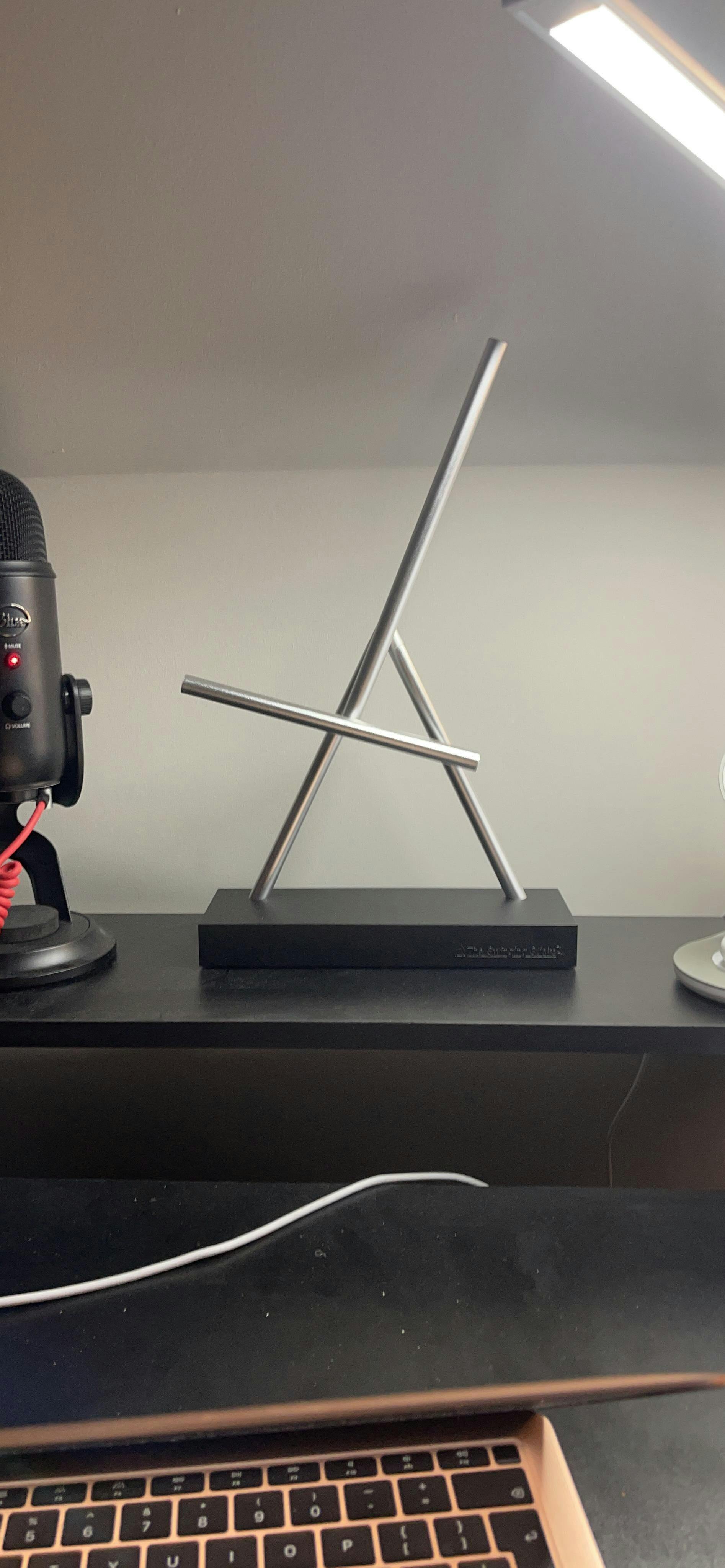 Customer photo for Infinite Motion Kinetic Sculpture — Swinging Sticks