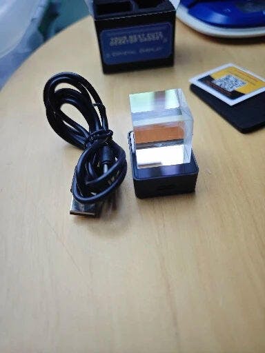 Customer photo for Hologram Cube Display – WiFi 3D Photo Frame