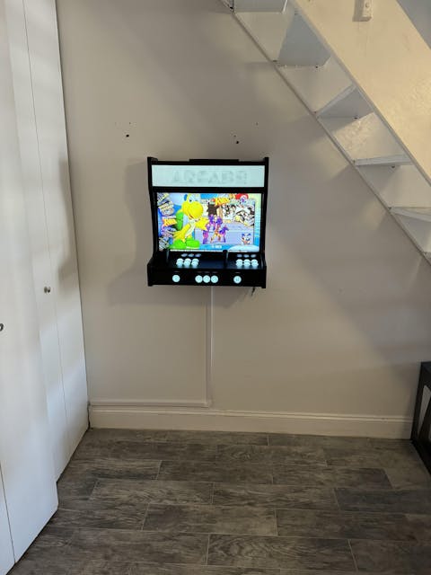 Black and White Wall Mounted Arcade Machine