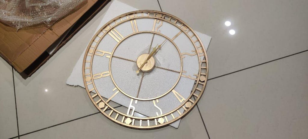 Black with golden Numeric Round Clock