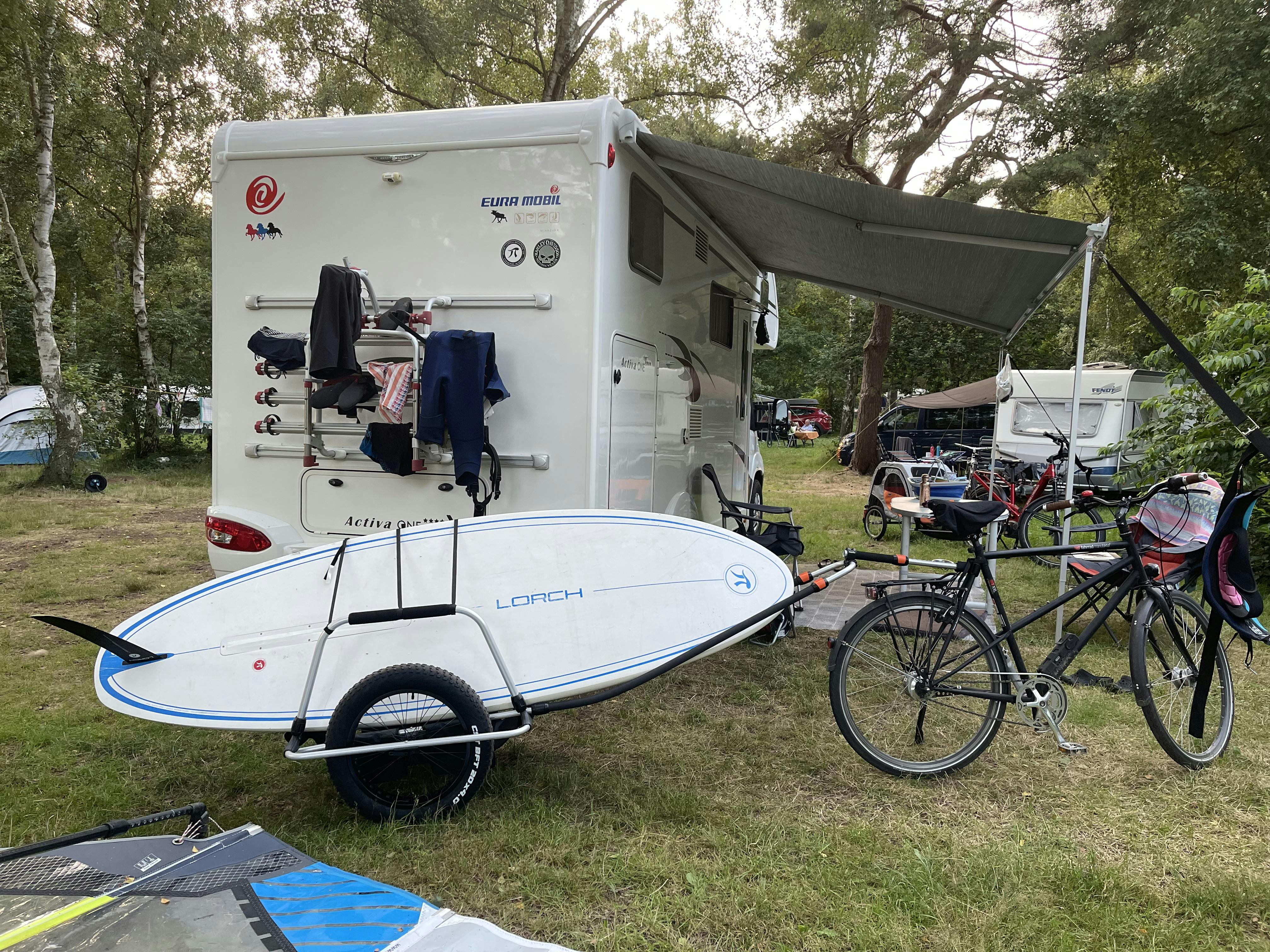 Bicycle surfboard shop trailer